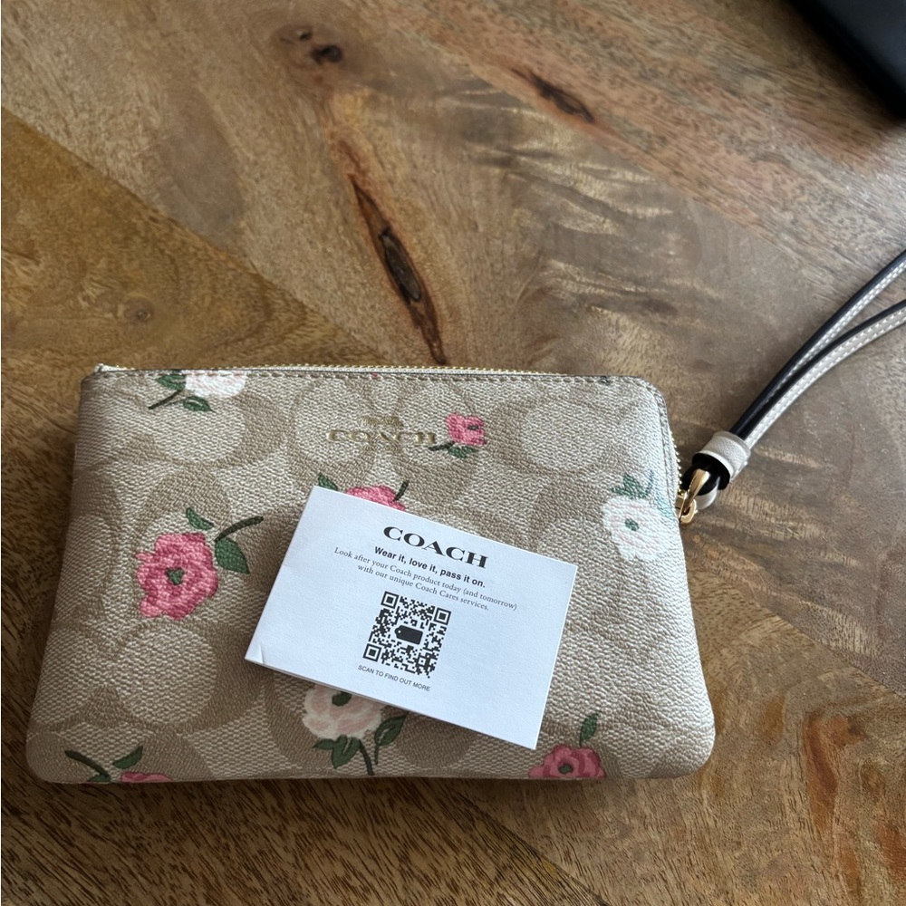 Coach Cream and Pink Floral Wristlet